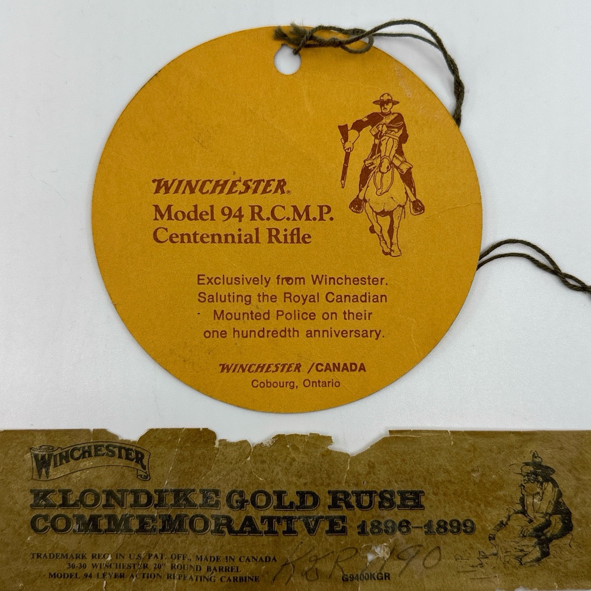 Winchester Mod 94 RCMP Original hang tag, Winchester Klondike gold rush box and label